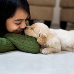Little girl whit a puppy